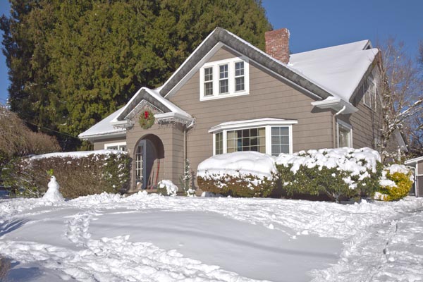image of house in winter that uses home heating oil